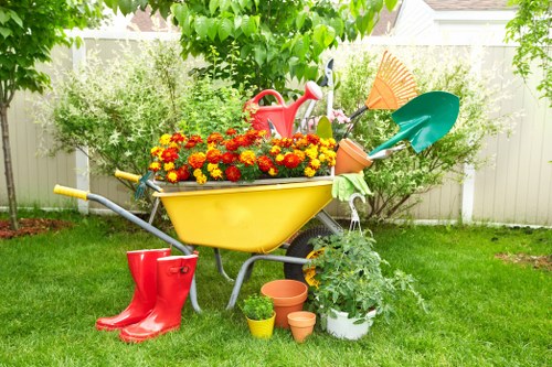 Gardening staff following health and safety procedures on site