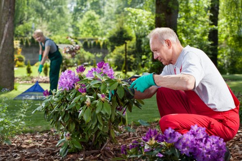 Gardeners Elmers End team sorting green waste for recycling